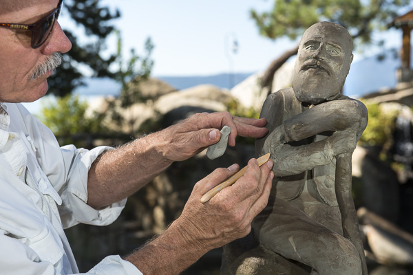 Ira Kessey sculpting outside at Lake Tahoe